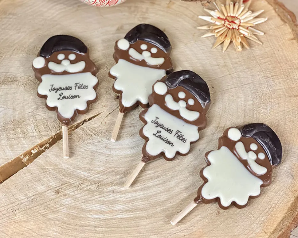 Lot de 4 sucettes Père Noël en chocolat au lait dont 2 personnalisées