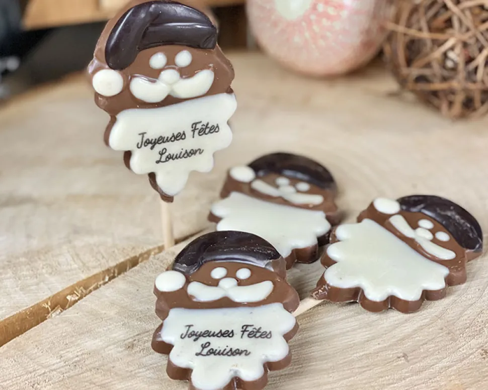 Lot de 4 sucettes Père Noël en chocolat au lait dont 2 personnalisées